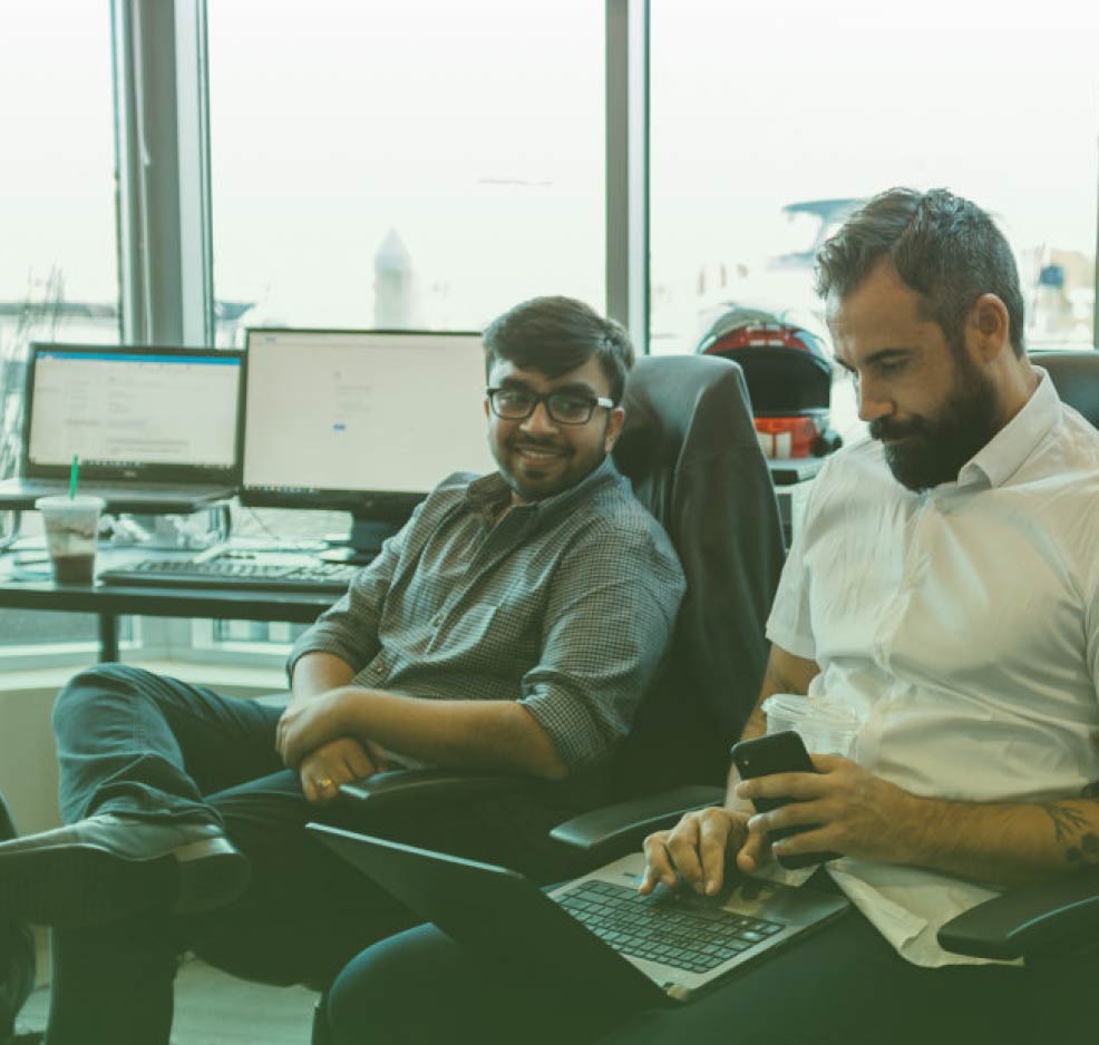 Team collaboration working on managed IT support solutions